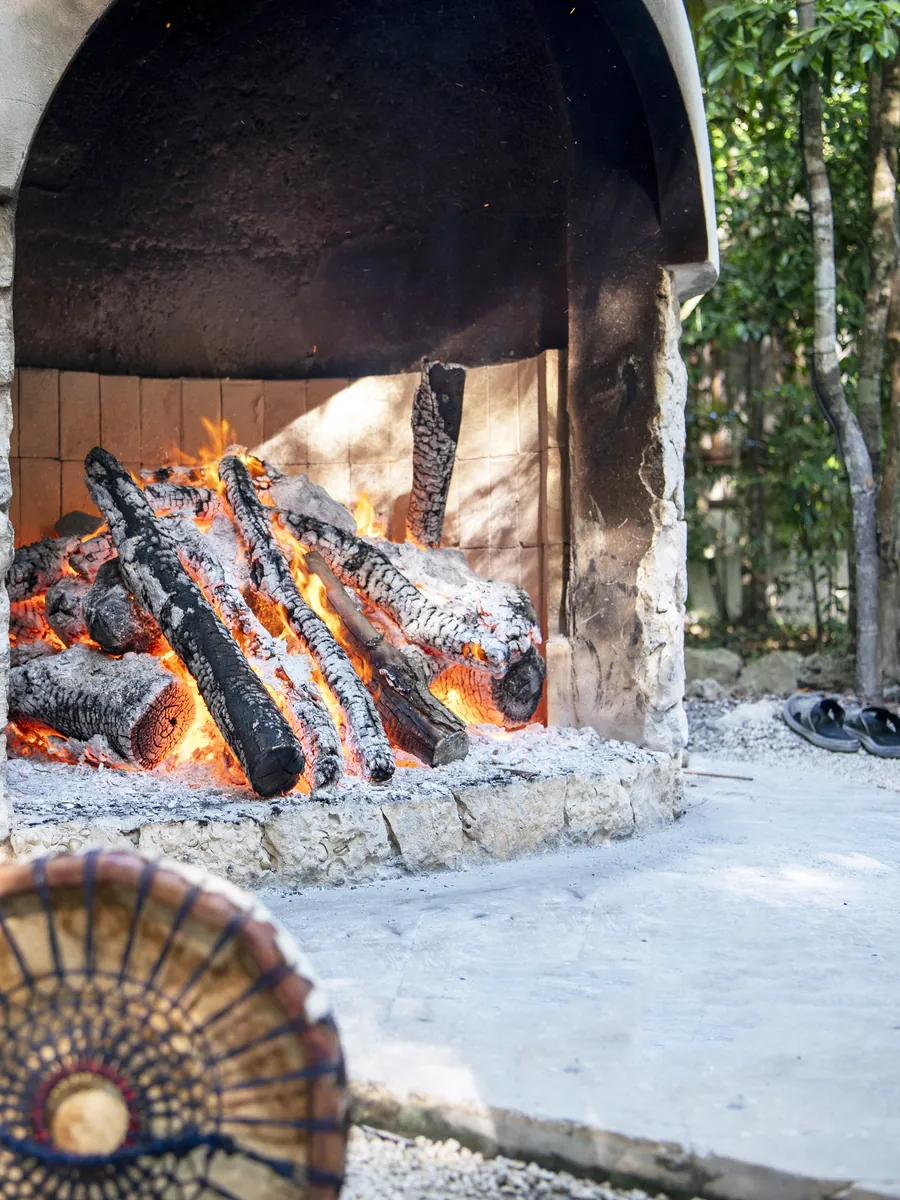 The temazcal fire at Holistika, lit for ceremony
